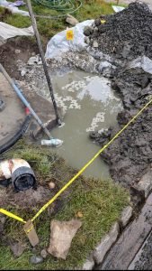 flooded-trench-sewer-line-replacement