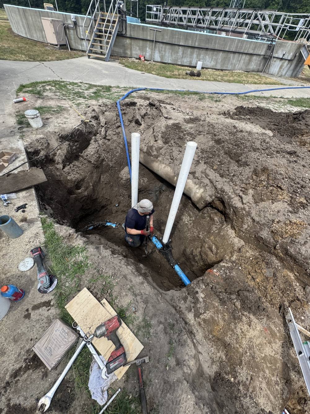 sewer-repair-project-blue-pipe-connection