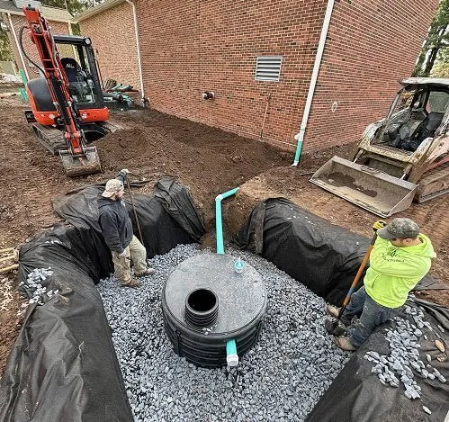 The Sewer Kings crew installing a septic tank at an Evesham, NJ residential property