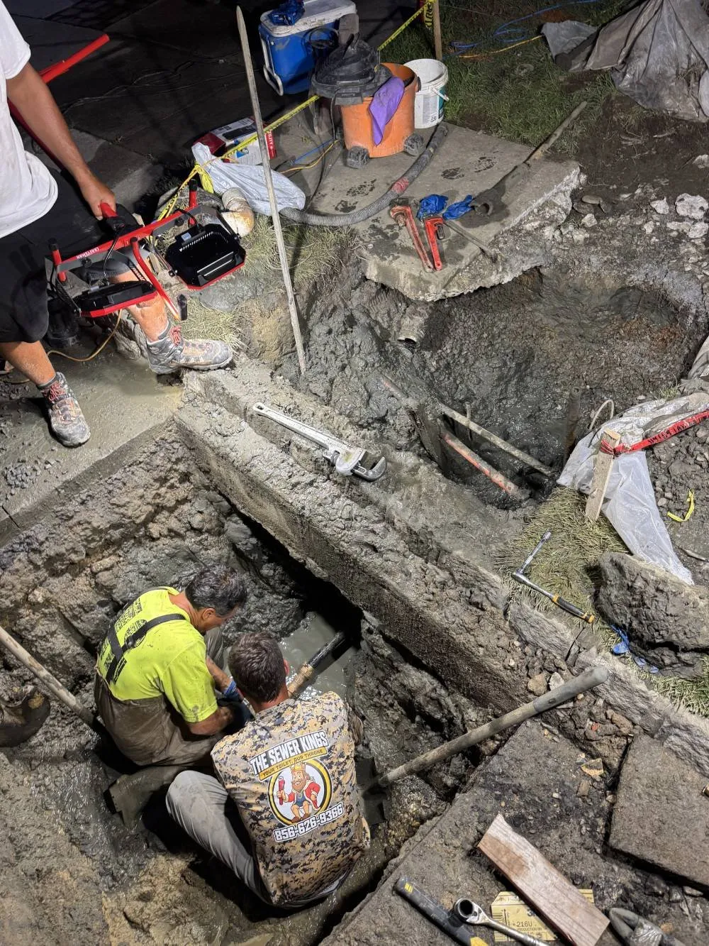 Late night emergency septic pipe connection repair by The Sewer Kings in South Jersey
