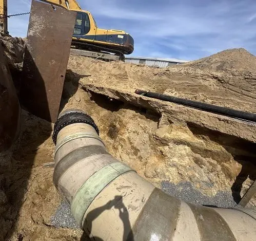 Drain Relining vs. Pipe Replacement: Which Fixes a Collapsed Drain Pipe joint exposed in an excavation to judge relining or replacement, collapsed drain work in Cherry Hill