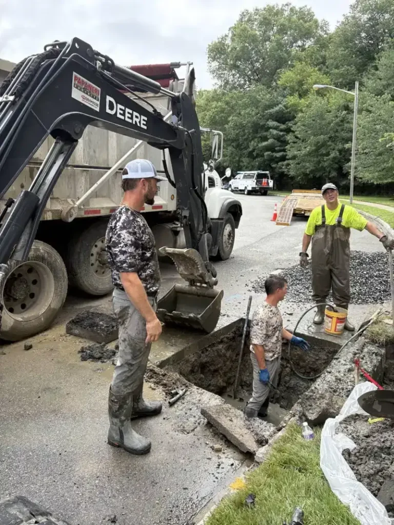 Who Is Responsible for the Sewer Lateral in Cherry Hill Township? Crew digging at the curb to reach a sewer lateral connection in Cherry Hill Township, NJ