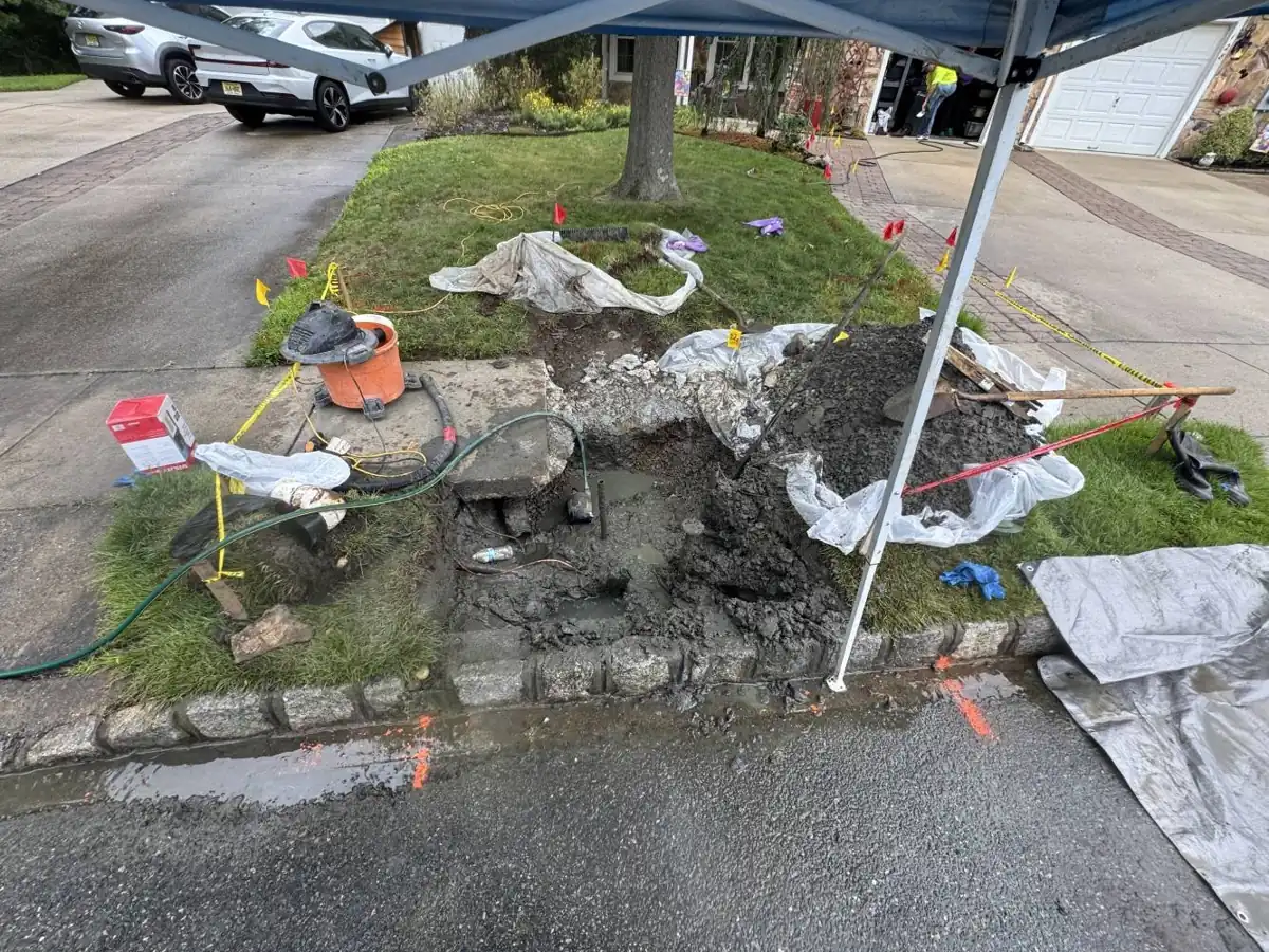 Sewer Line Repair near Connolly Park, NJ Curbside sewer lateral dig at the edge of a front lawn near Connolly Park, NJ