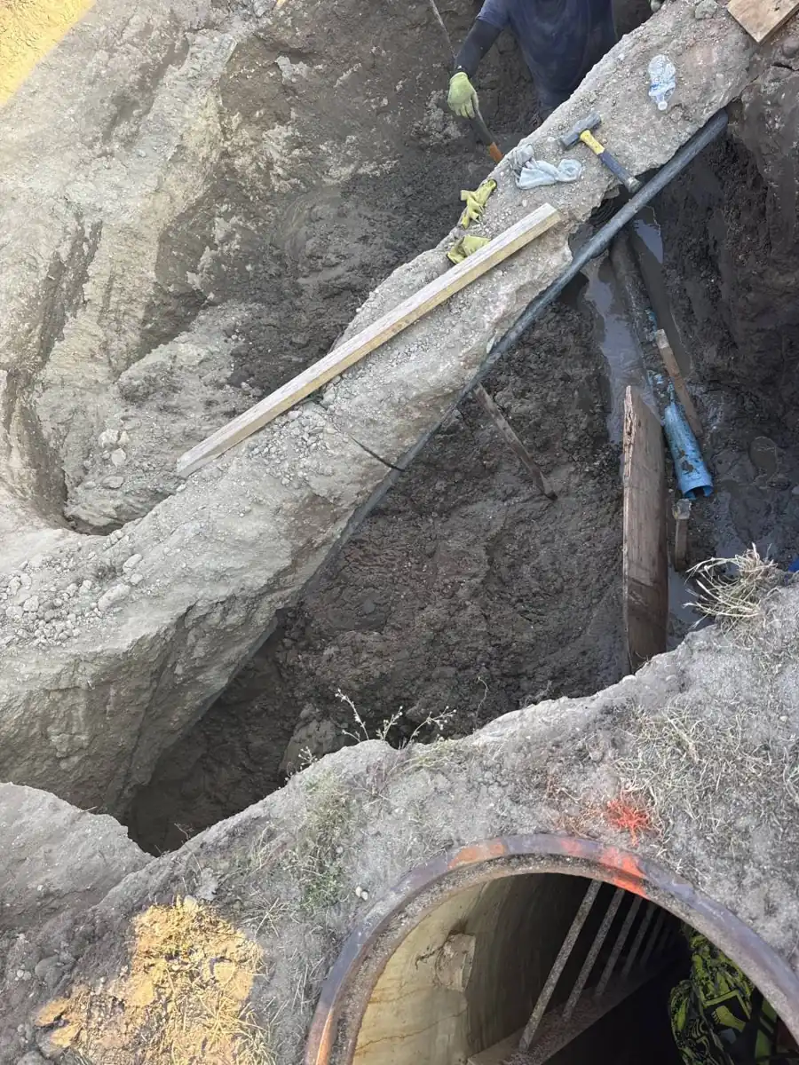 Sewer Line Repair near Cranberry Pines Elementary School, NJ Deep trench opened to reach an old sewer pipe near Cranberry Pines Elementary School, NJ