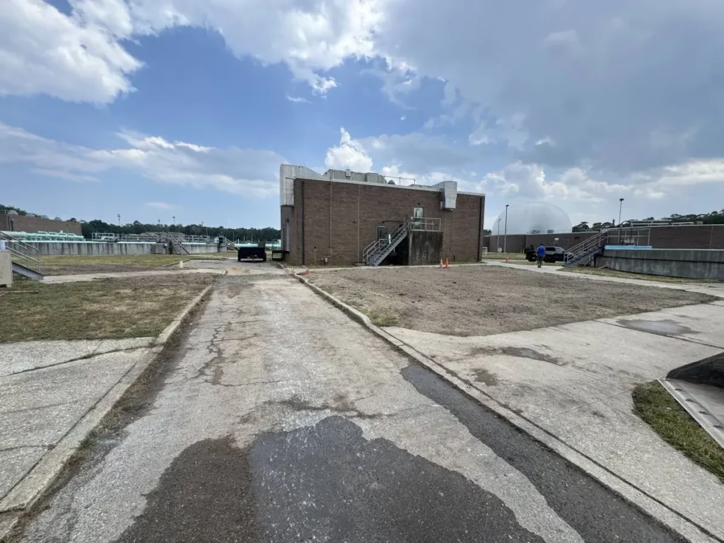 Sewer Line Repair for Restaurants and Shops on Route 70 and Route 73 Fresh asphalt patch across a paved commercial lot after a sewer line repair in Evesham, NJ